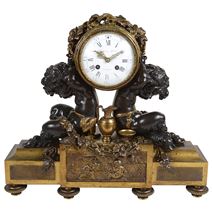 French Louis XVI style bronze mantel clock.