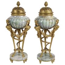 Large Pair 19th Century ormolu and quartz lidded urns.