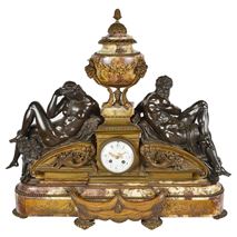 Tiffany mantel clock with bronze statues representing day and night