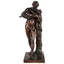 A Grand tour 19th Century Bronze statue of Silenus cradling the infant Dionysus.
