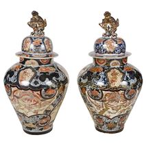 Pair of 18th Century Japanese Imari lidded vases.