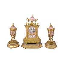French 19th Century Sevres style clock set.
