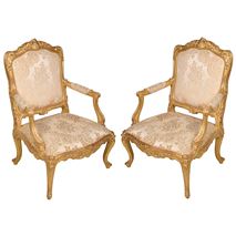 Pair 19th Century French carved gilt wood Louis XVI style arm chairs