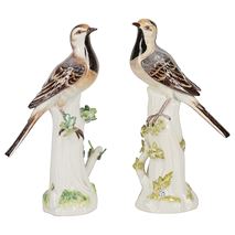 Pair Meissen porcelain Wag tails perched on a tree stump, circa 1900