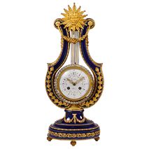 A French Sevres style porcelain and ormolu-mounted  lyre clock
