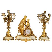 19th Century French marble and ormolu clock garniture.