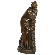 Classical Bronze maiden resting on a rock, 19th century