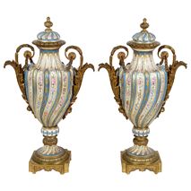 Pair 19th Century Sevre style lidded vases.