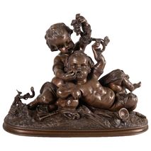 19th Century bronze Bacchus group of two putti playing with grapes.