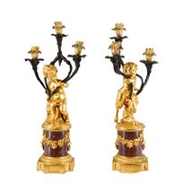 Fine pair 19th Century cherub candelabra on Porphyry bases. 50cm(20")