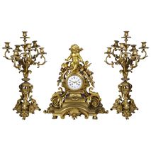 Large 19th Century French gilded clock set.