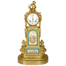 19th Century Sevres style gilded ormolu mantel clock.