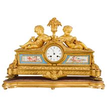 Louis XVI, ormolu and Sevres style mantle clock, 19th Century. 55cm(21.5") wide