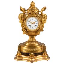 19th Century French ormolu urn shape mantel clock.