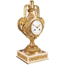 French 19th Century gilded ormolu and marble mantle clock.