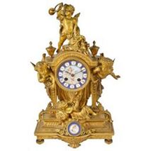 Louis XVI style gilded ormolu mantel clock with three cherubs
