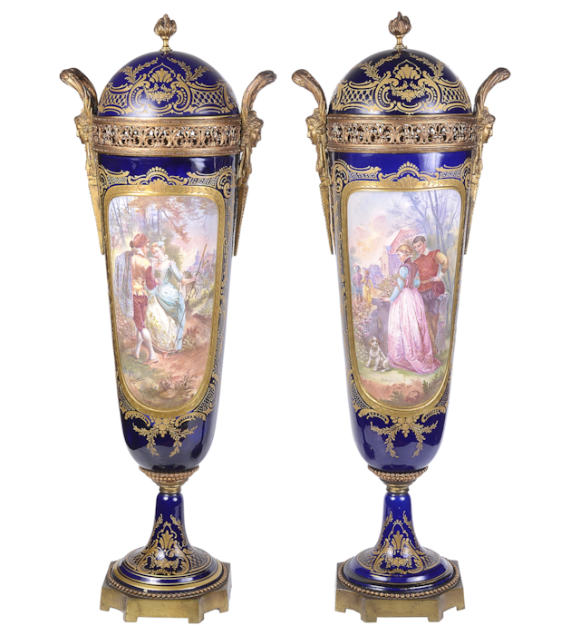 Large pair 19th Century Sevres style lidded vases.