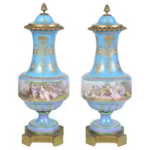 Pair 19th Century Sevres style lidded vases.