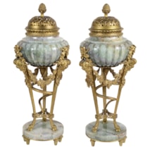Large Pair 19th Century ormolu and quartz lidded urns.