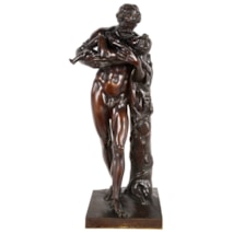 A Grand tour 19th Century Bronze statue of Silenus cradling the infant Dionysus.