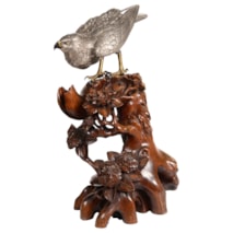A SILVERED-BRONZE MODEL
OF A GOSHAWK
