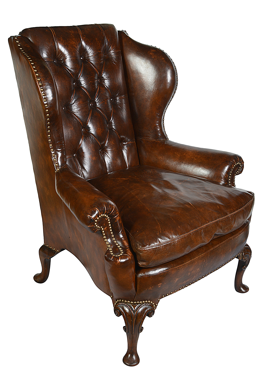 Pair Georgian style leather button back arm chairs.