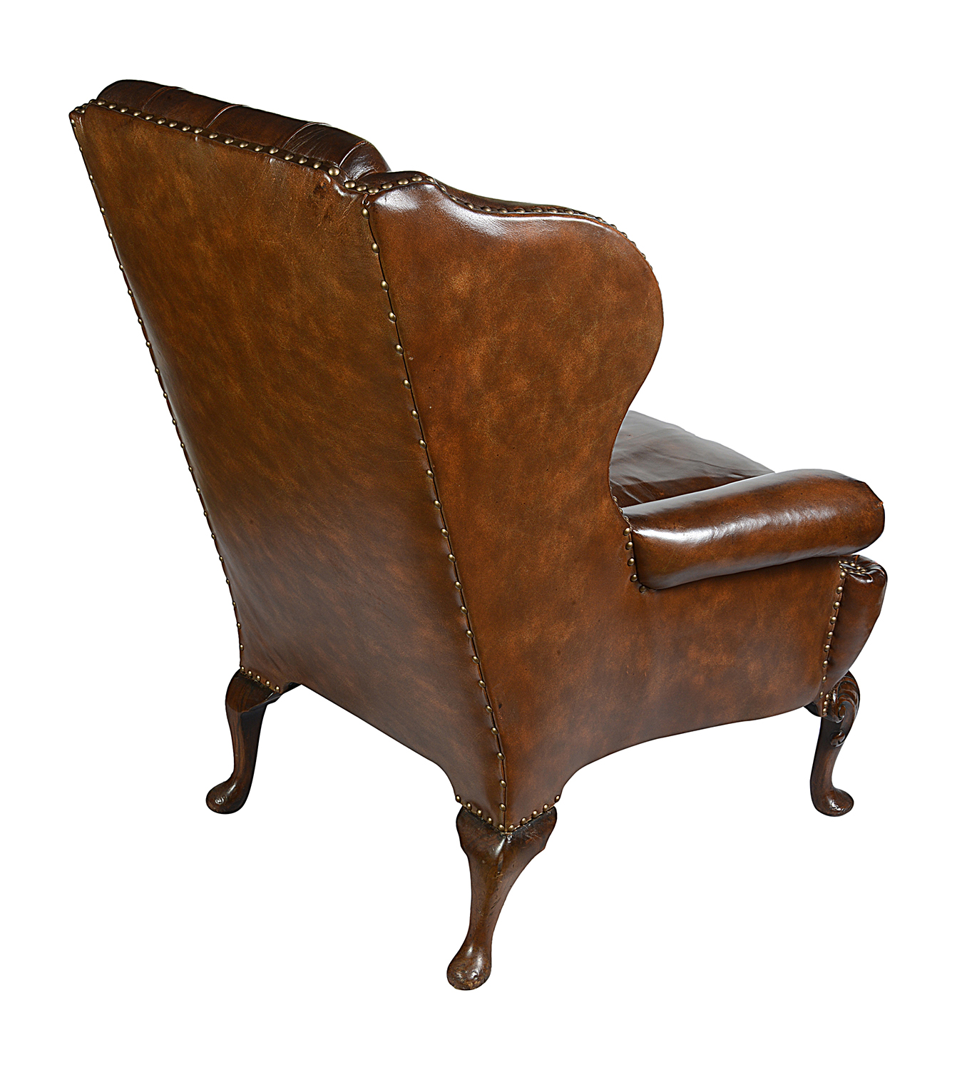 Pair Georgian style leather button back arm chairs.