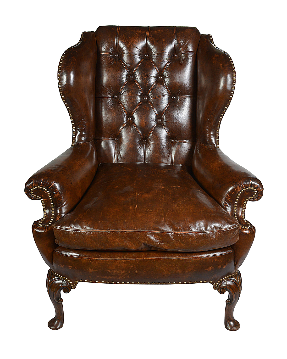Pair Georgian style leather button back arm chairs.