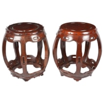 Pair Chinese early 20th Century hardwood garden seats