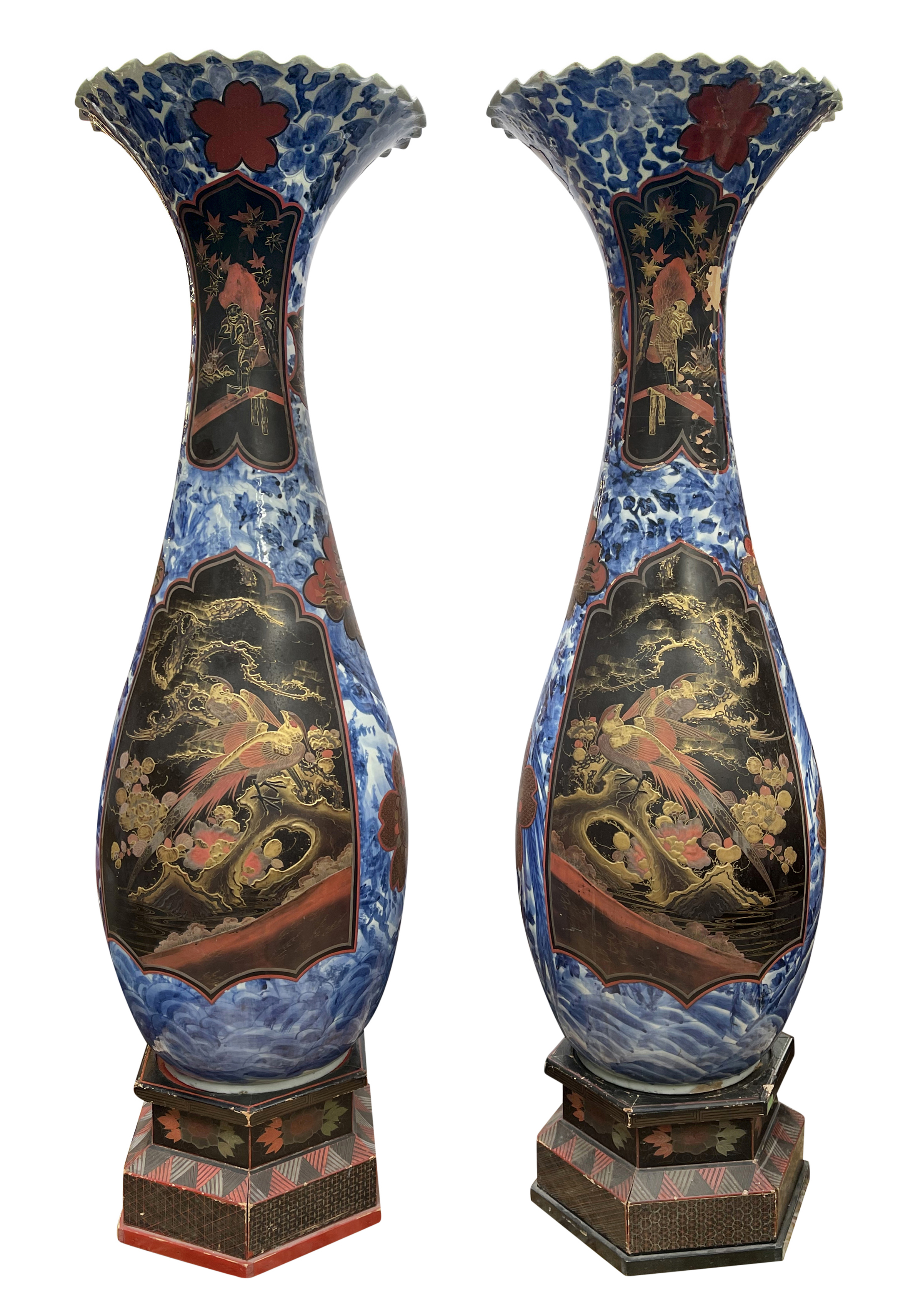 A very large and decorative pair of late C19th Japanese Blue + White vases with lacquer panels. 58" high